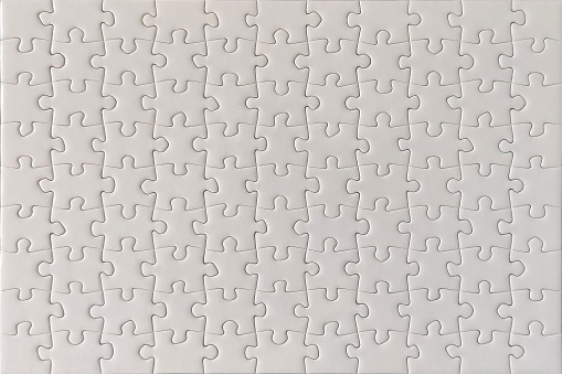 Blank white jigsaw puzzle texture background