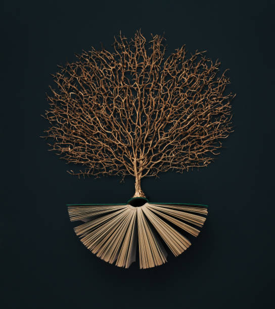 Golden tree growing from the old book, Education and knowledge concept. Flat lay.