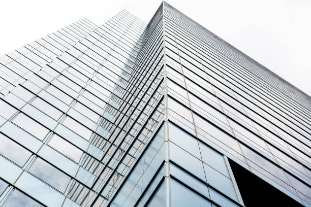 istock Low angle view of modern office building, skyscrapers, background with copy space 1364475563
