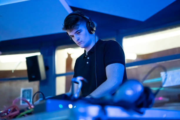 istock Deejay mixing at party. High quality photography. 1364475734