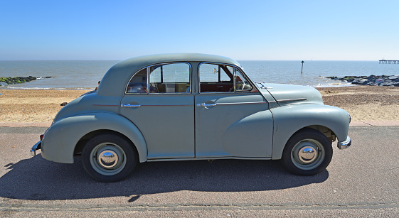 Felixstowe, Suffolk, England -  Mat 06, 2018: Classic Grey  Morris Oxford Motor Car Parked on Seafront Promenade.