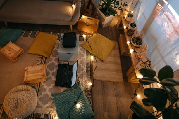 istock Living room with projector screen and cushions 1364484916