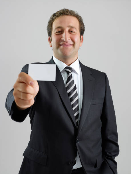 istock Businessman Showing Business Card 1364486015