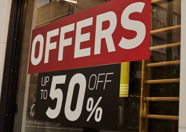 istock Sale offer banner on a window 1364491498
