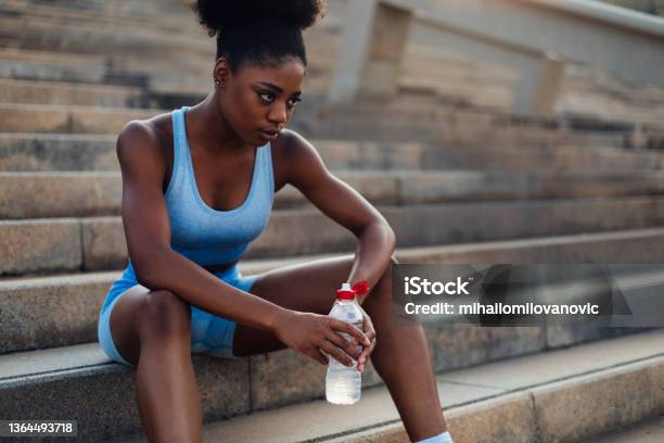 Ready To Continue Her Workout Stock Photo - Download Image Now - African-American Ethnicity, Black People, Exercising