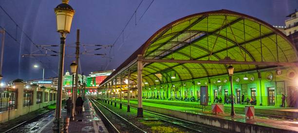 View on the train station of Algiers with its colonial architecture at night under a cloudy sky in Algiers