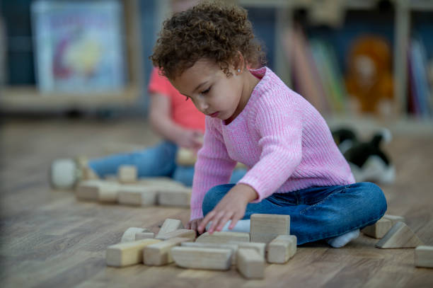 istock Preschoolers building with blocks 1364503781
