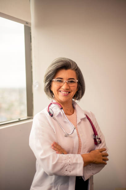 istock Doctor in clinical office. smiling at the camera. 1364504114