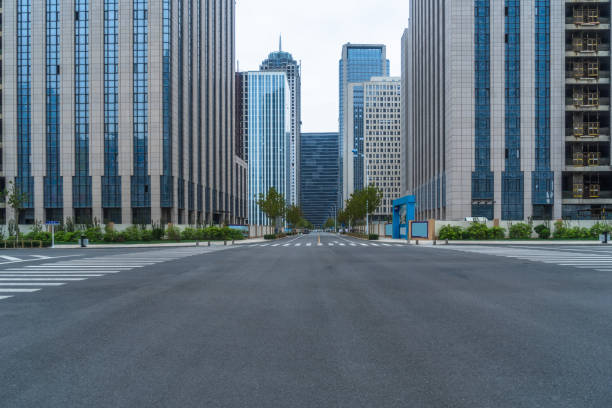istock city empty traffic road with cityscape in background 1364514139