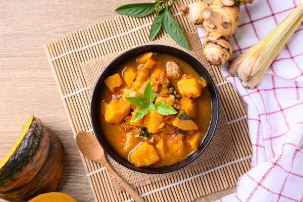istock Thai spicy pumpkin curry soup with pork 1364518564