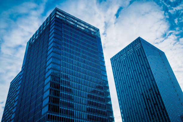 istock Low angle view of modern metallic skyscrapers 1364518676