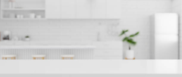 istock Elegance white and bright kitchen room interior background with kitchen island. 1364521114