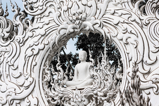 A Buddha statue in the White Temple, Chiang Rai Province, Thailand