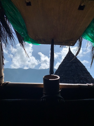 Waerebo’s unique houses called “Mbaru Niang” that are tall and conical in shape and are completely covered in lontar thatch from its rooftop down to the ground.