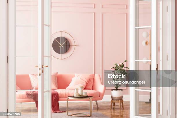 Entrance Of Living Room With Pink Sofa Potted Plant And Coffee Table Stock Photo - Download Image Now