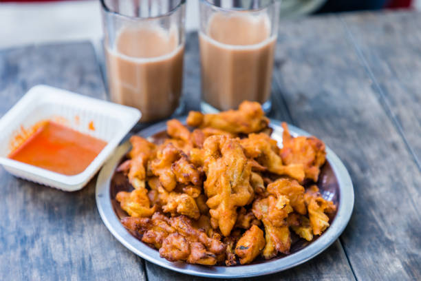 istock ginger chai + assorted pakora's = warming the soul in winters 1364532598