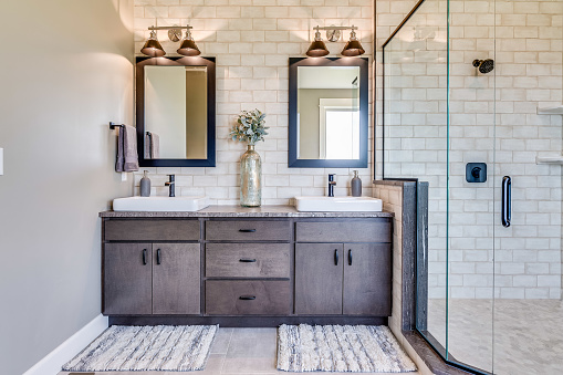 Gorgeous double mirrors and subway tile wall