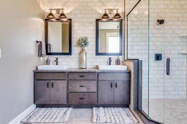 Double vanity with vessel sinks Gorgeous double mirrors and subway tile wall light fixture stock pictures, royalty-free photos & images