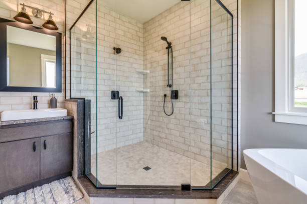 Corner shower with three glass sides stock photo