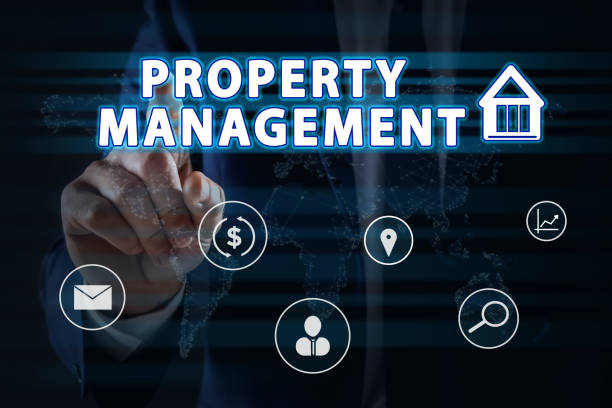 istock Property management concept. Man using virtual screen with icons, closeup 1364541695