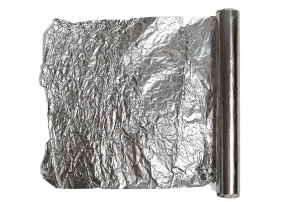 istock Roll of baking foil on white background. 1364541775