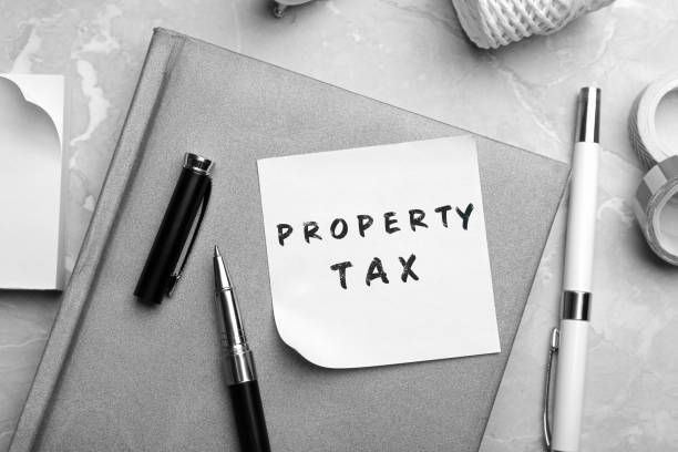 istock Note with text Property Tax and stationery on table, flat lay 1364541843