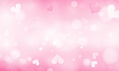 istock Pink abstract blurred background with blur bokeh light effect for wedding vector Happy Valentine's day card hearts poster design. 1364553431