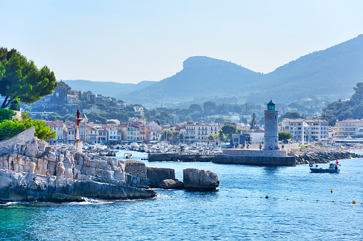 The Cassis Lighthouse is situated at the mouth of the town's famous boat harbor in French Riviera