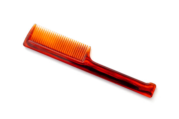 Simply plastic small comb or hairbrush isolated on white, top view