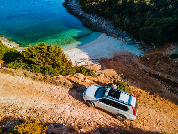 car travel concept sea vacation happy woman