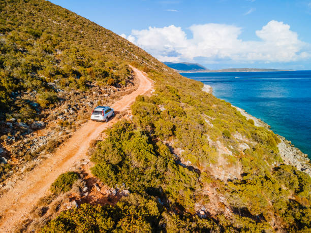 istock suv car at trail road sea vacation 1364556408