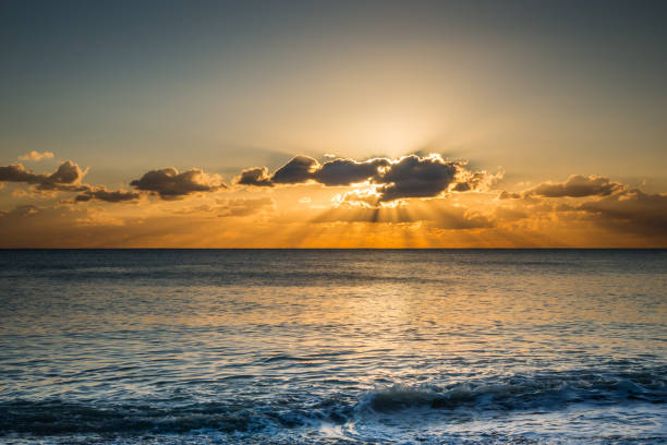 istock Perfect seascape view from a beach at sunset 1364558680