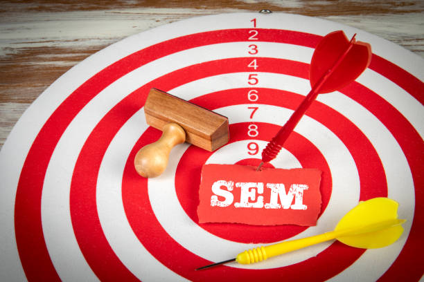 istock SEM search engine marketing. Red target and darts 1364564828
