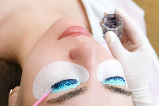 istock Eyelash lamination. Eyelash coloring in the salon 1364565750