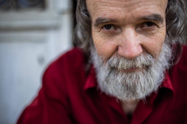 istock Close up of the senior man looking at camera 1364566549
