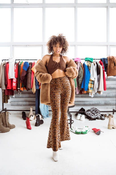 istock Female fashion stylist in her studio 1364567455
