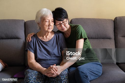 istock Asian daughter spending time with her elderly mother at home 1364570745