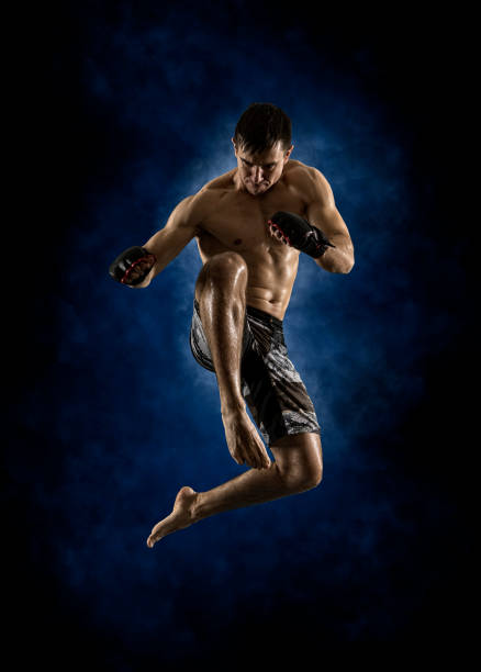istock MMA male fighter kick 1364571290
