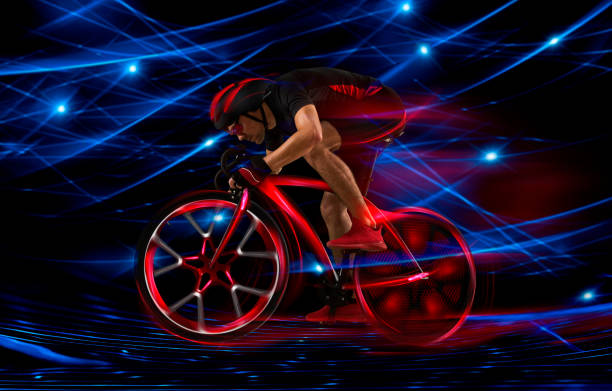 istock Man racing cyclist on dark background 1364573763