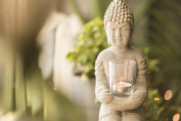 istock Statue of Buddha and a small meditation 1364574542