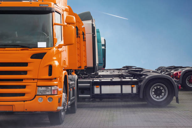 istock Orange truck parked beautifully with front view and copy space 1364579590