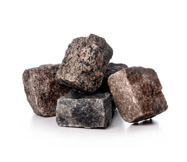 istock granite stone cobbles isolated on white background. natural cobblestone 1364581465