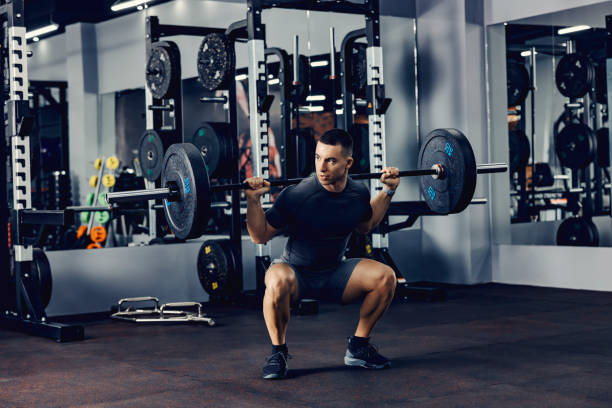 istock A strong man doing deadlift with weights in a gym. 1364581987