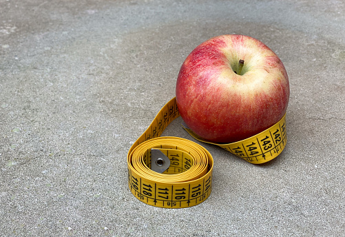apple and meter to measure