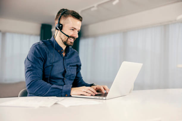 istock A focused teleworker working on the laptop from home. 1364586077