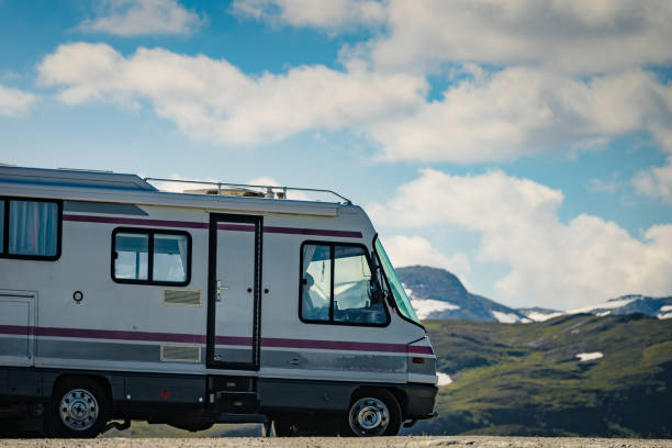 istock Camper car on roadside in norwegian mountains 1364586674