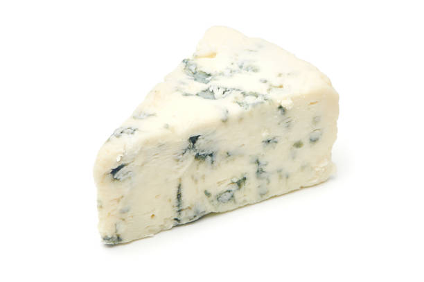 istock Blue cheese isolated on white background. Triangular piece of gorgonzola cheese. Clipping path and full depth of field 1364587605