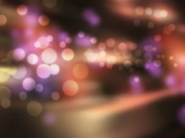 Photo of City lights at night - abstract defocused urban street scene - sparkling bokeh background