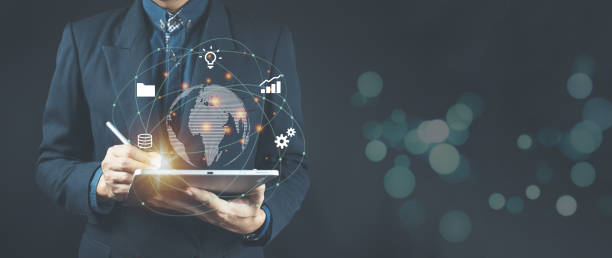 istock Businessman using tablet Smart Business Technology Global Internet Connection and Digital Marketing. 1364593240