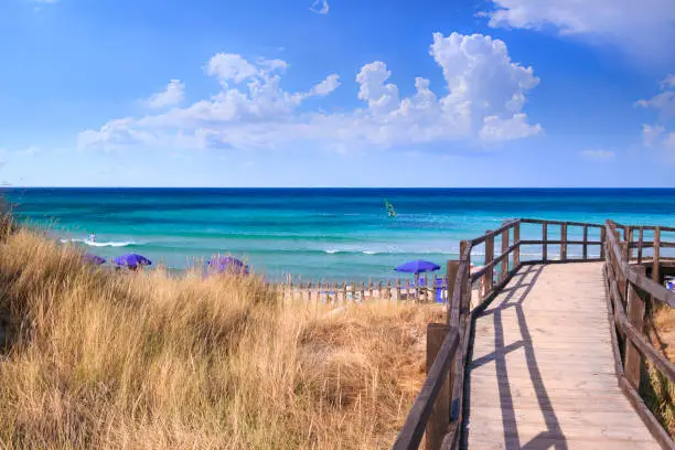 Blue sea and dunes dotted with Mediterranean scrub, a few kilometres away from Ostuni, the beaches in the locality Pilone offer amazing views.